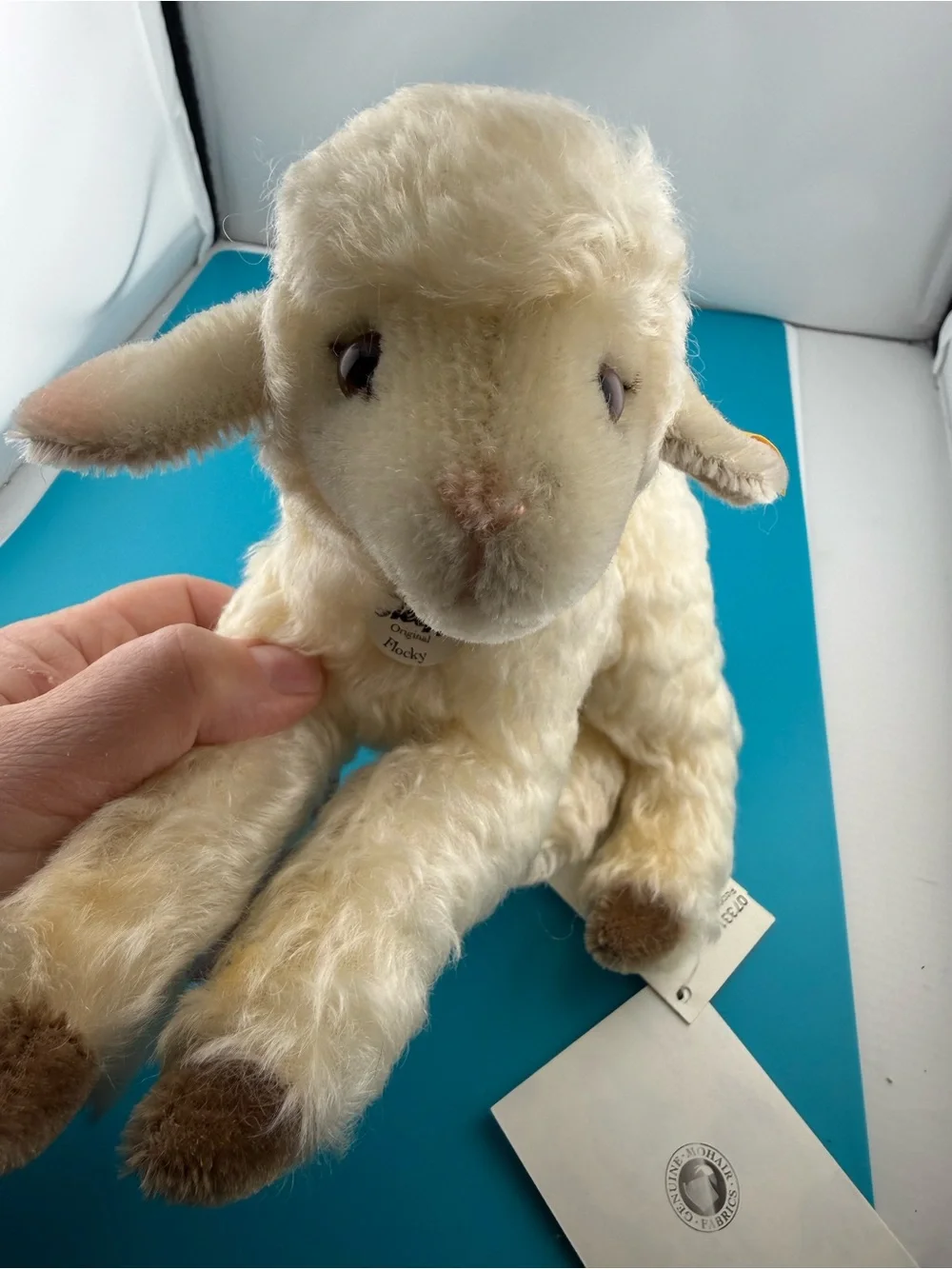 Cream Plush Lamb with Brown Hoof Accents and Yellow Ear Ribbon
